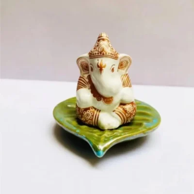 Leaf Ganesh Car Dashboard Showpiece – Premium 7cm Decorative Idol in Marble Finish | (White & Green) | JUSTMOD