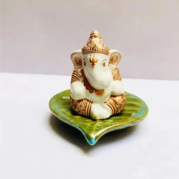 Leaf Ganesh Car Dashboard Showpiece – Premium 7cm Decorative Idol in Marble Finish | (White & Green) | JUSTMOD